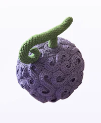 a crocheted purple grape with a green stem