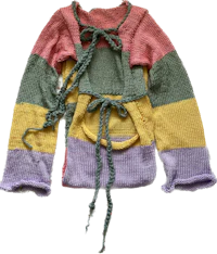 a child's sweater with a rainbow striped pattern